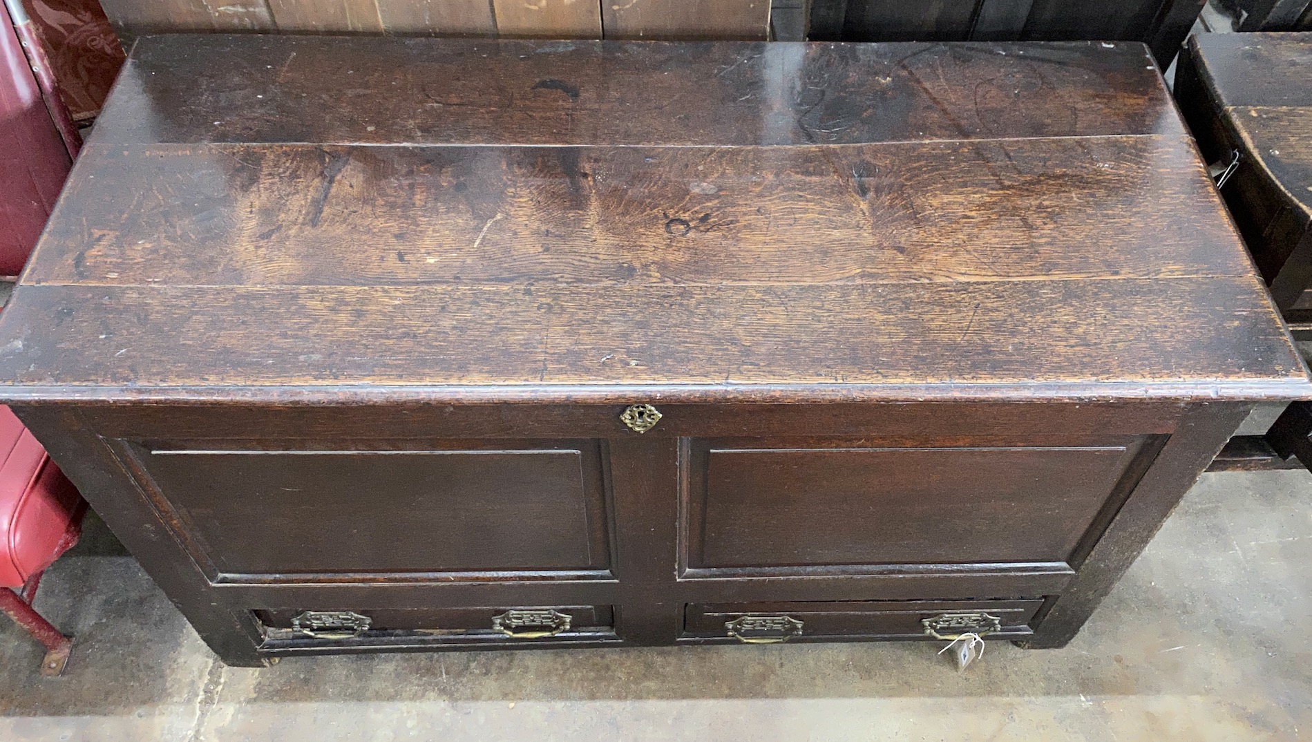 An 18th century oak mule chest, width 131cm, depth 56cm, height 69cm